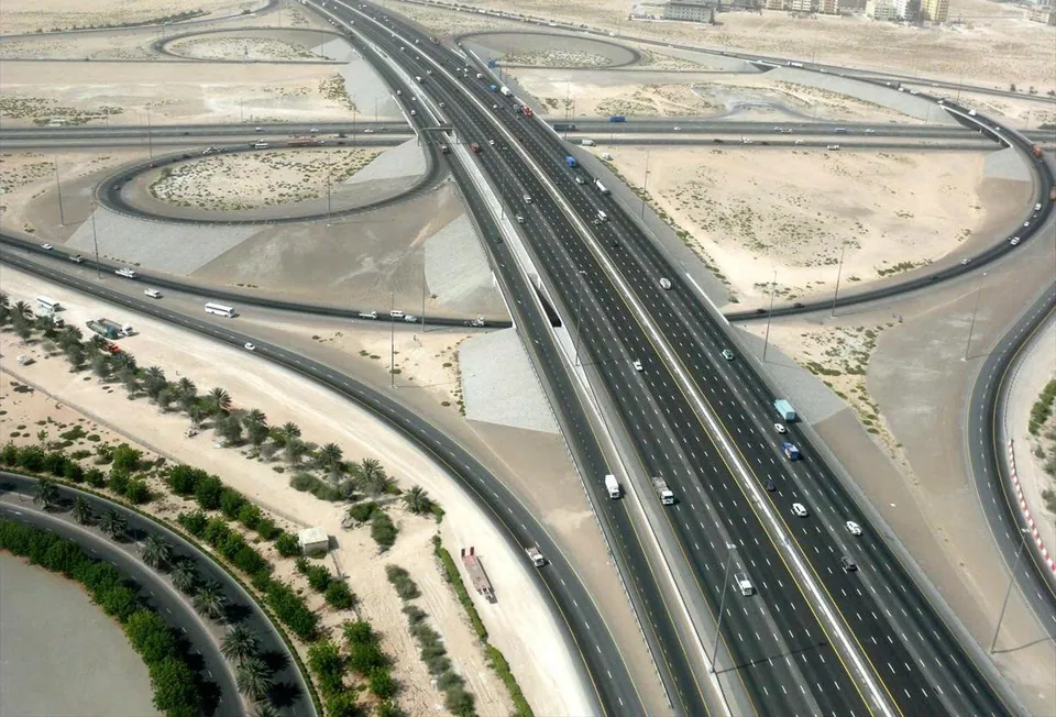 Aerial view of a multi-level highway interchange in Dubai