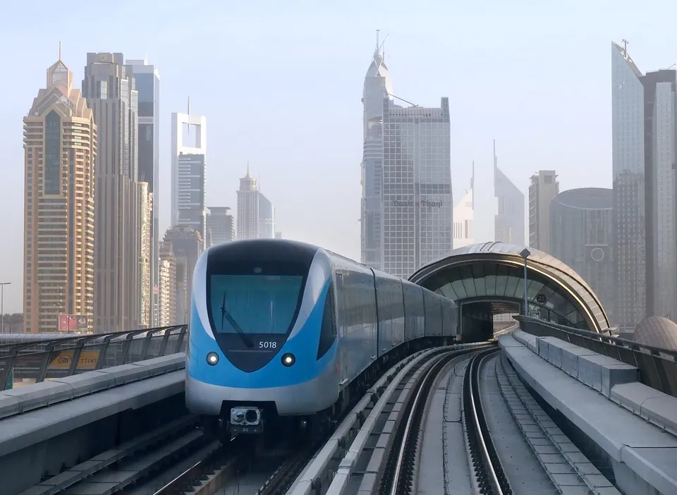 A Dubai Metro train at a station platform